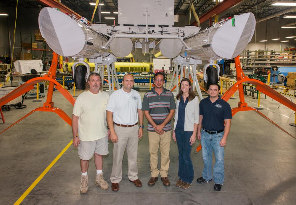 The NSWC Panama City Division In-Service Engineering Agent team for the MK-105 Mod 4 Airborne Magnetic Influence Minesweeping System includes, from left to right: Joe Lowry, Steven Gilbert, Todd Loyd, Leah Dunham, Angel Sarraga. (Photo by Anthony Powers, NSWC PCD/RELEASED)