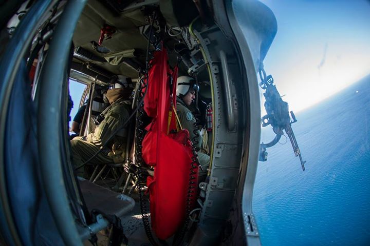 CAMP PENDLETON, Calif. (Oct. 24, 2014) Gunner’s Mate 2nd Class Garrett Osborne and Quartermaster Seaman Yasmin Wild, assigned to Beachmaster Unit 1, signal Landing Craft Air Cushion 59 off the beach after delivering the last load of the day during Exercise Pacific Horizon 2015. Pacific Horizon is a scenario-driven, simulation supported crisis response exercise designed to improve 1st Marine Expeditionary Brigade’s and Expeditionary Strike Group 3’s interoperability and strengthen Navy-Marine Corps relationships by conducting an in-stream Maritime Prepositioning Force offload of equipment, by providing host country civil-military security assistance, and by conducting infrastructure restoration support. (U.S. Navy photo by Mass Communication Specialist Seaman Eric Chan/Released).